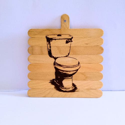 Cartel para bano grabado en madera.jpg